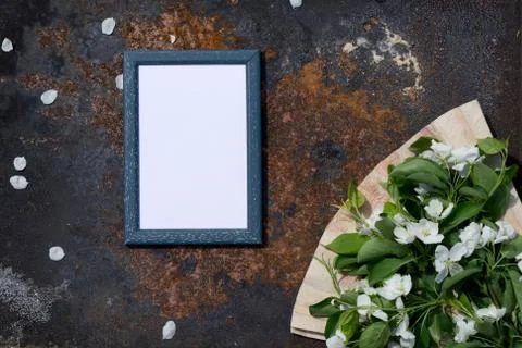 Creative top view apple tree blooming flowers brunch frame, paper fan on  rus Stock Photos