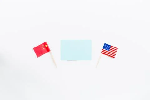 Creative top view flat lay of China and USA flag, mockup and copy space on wh Foto stock
