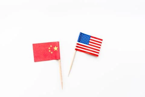 Creative top view flat lay of China and USA flag, mockup and copy space on wh Stock Photos