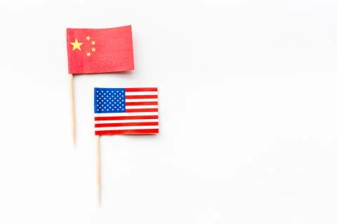 Creative top view flat lay of China and USA flag, mockup and copy space on wh Stock Photos