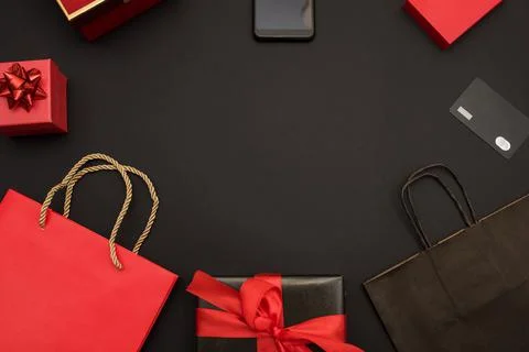 Creative top view, flat view for online shopping, bank card, phone, gift boxes Stock Photos