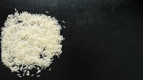 Creative top view stop motion animation of white rice grains forming the wo.. Vídeos de archivo 334664577