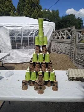 Creative tower of stacked cups made from various colors showcases artistic .. Stock Photos