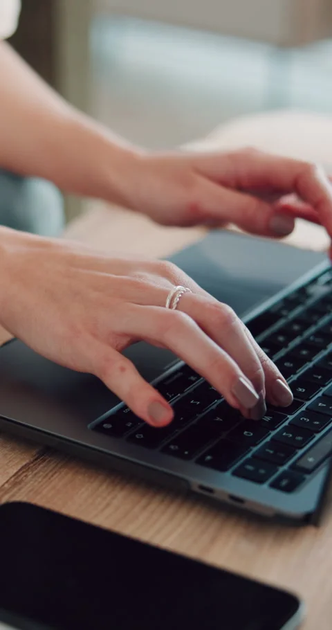 Creative, typing and hands with laptop on desk, self publishing and editing Stock Footage 333364515