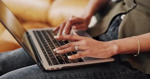 Creative, typing and hands with laptop in lounge, copywriting or freelancer with Stock Footage 336847419