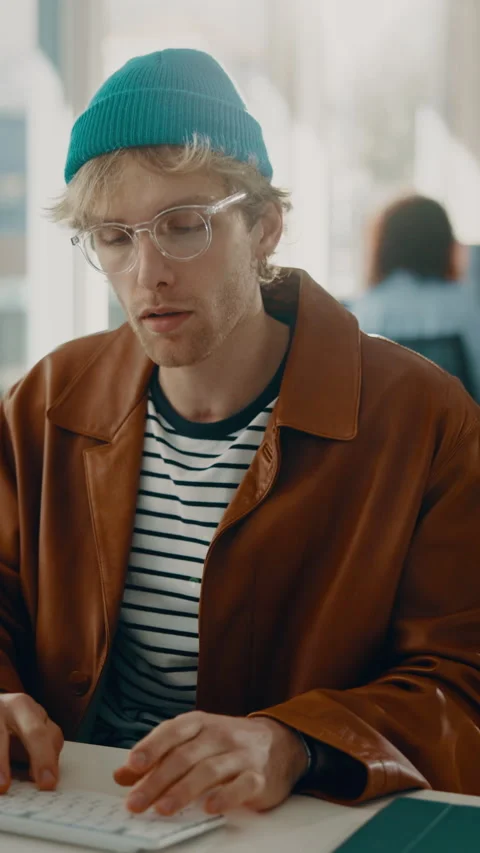 Creative, typing and man with computer in office, copywriting or planning for Stock Footage 338186461
