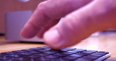 Creative Typing on Apple Keyboard Stock Footage 312177949