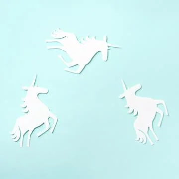 Creative unicorn pattern on blue background. Abstract art texture Minimal Stock Photos