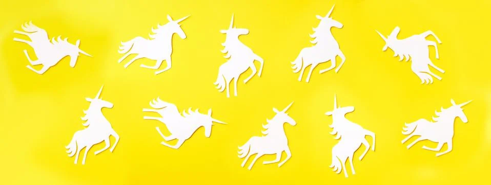 Creative unicorn pattern on yellow background. Abstract art texture Minimal Stock Photos