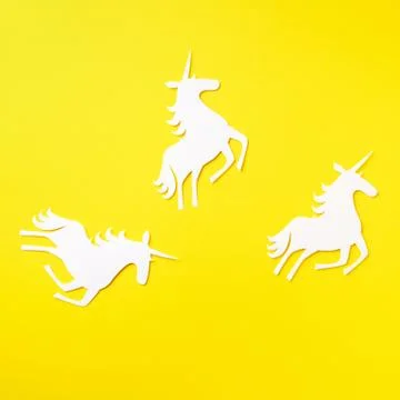 Creative unicorn pattern on yellow background. Abstract art texture Minimal Stock Photos