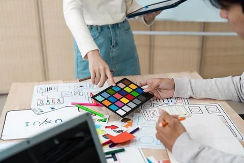 Creative UX UI Design Process with Color Palette and Wireframes on Desk Stock Photos