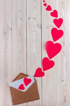Creative valentine's day composition, white wooden background with envelope 스톡 사진