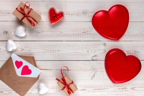 Creative valentine's day composition, white wooden background with gifts 写真素材