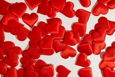 Creative Valentines Day Concepts With Red Heart Decorations on a White Surface Stock Photos