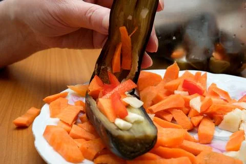 Creative vegetable preparation for a vibrant dish in the kitchen Stock Photos