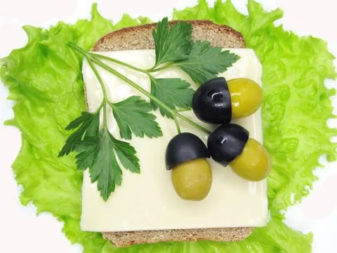 Creative vegetable sandwich with olives Stock Photos