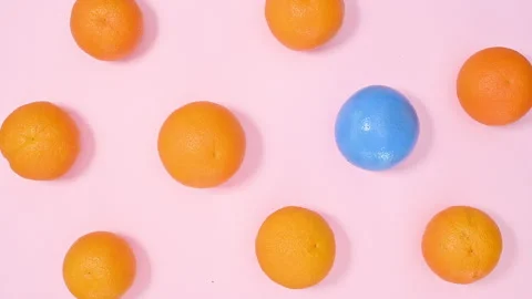 Creative vivid colors oranges pattern on pink background. stop motion Stock Footage 192459025