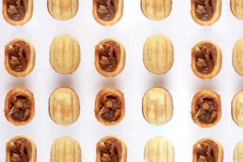 Creative walnut cookie mockup. Food concept. Cookies on a white background. Stock Photos