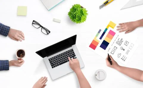 Creative web design studio concept. Work meeting. Top view, flat lay work des Stock Photos