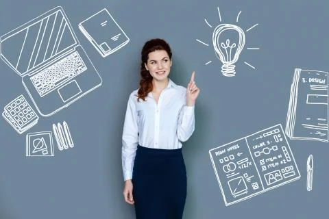 Creative web developer smiling while getting a nice idea Stock Photos