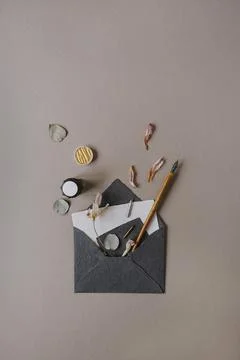 Creative wedding celebration invitation concept. Flatlay envelope with paper  Stock Photos