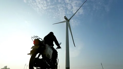 Creative Wind Turbine Against Blue Sky for Renewable Energy in India Stock Footage 341386750