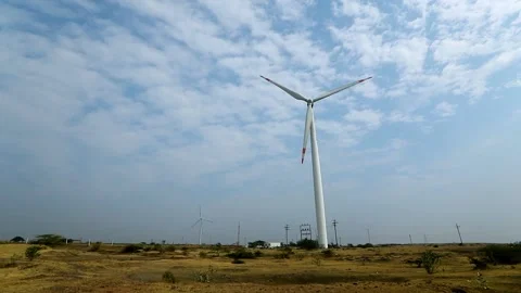 Creative Wind Turbine Against Blue Sky for Renewable Energy in India Stock Footage 341386756