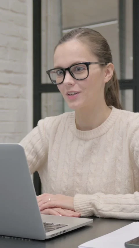 Creative Woman Doing Video Chat at Work, vertical video Stock Footage 325831355