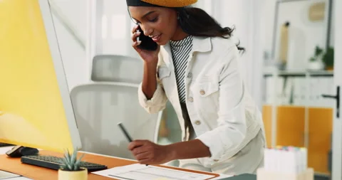 Creative woman, notes and phone call with computer for discussion, questions and Stock Footage 308531593