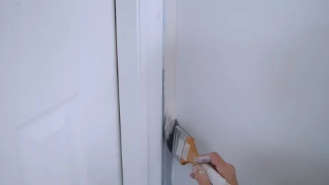 Creative Woman Repaints Wall Inside Her Home For A Modern Touch Video stock 312523882