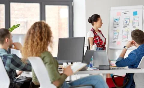 Creative woman showing user interface at office Foto stock