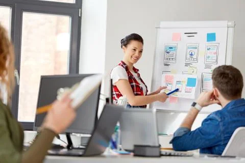 Creative woman showing user interface at office Foto stock