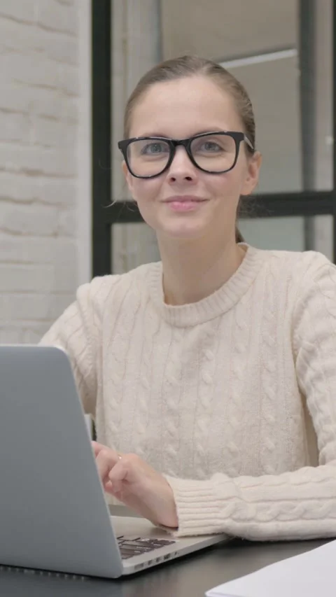 Creative Woman Smiling at Camera at Work, vertical video Stock Footage 325831504