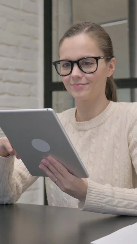 Creative Woman Using Digital Tablet at Work, vertical video Stock Footage 325831978