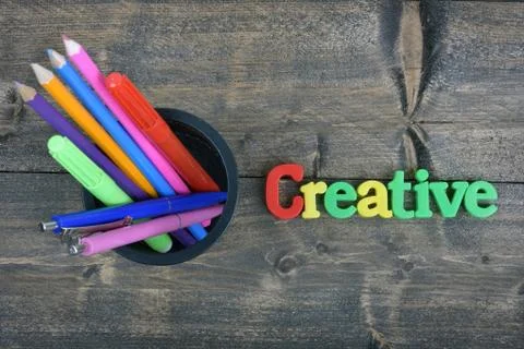 Creative on wooden table Photos