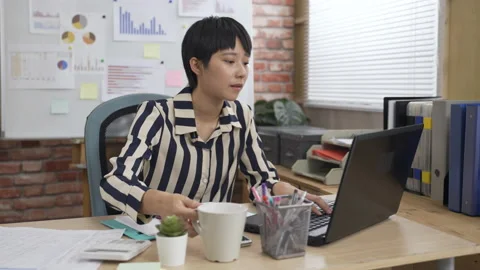 Creative worker is writing in her notebook Stock-Footage 159007873