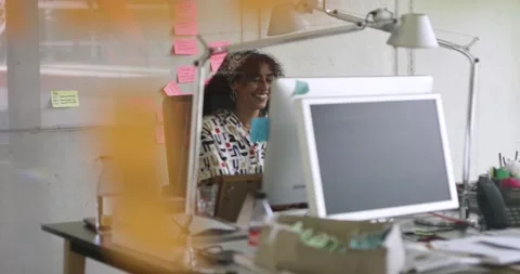 Creative working in start up office	 Stock Footage 143465346