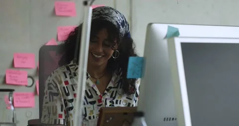 Creative working in start up office	 Stock Footage 143465368