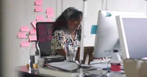 Creative working in start up office	 Stock Footage 143465441