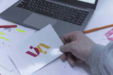 Creative workplace of a Graphic Designer. A man in the office is developing a Stock Photos