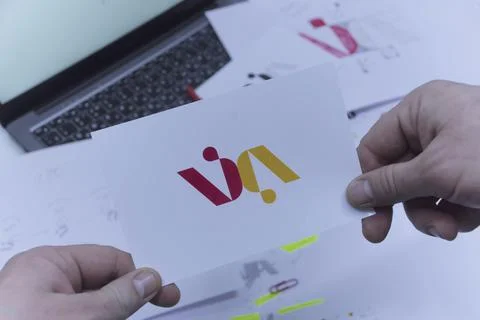 Creative workplace of a Graphic Designer. A man in the office is developing a Stock Photos