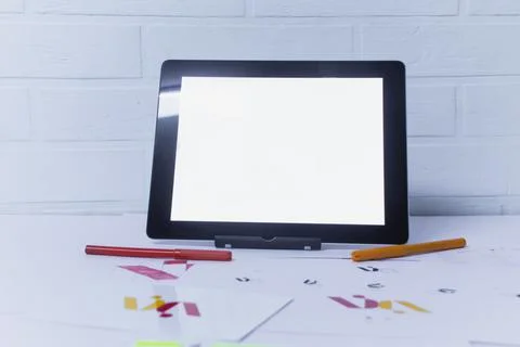 Creative workplace of a Graphic Designer with Tablet. Development of a logo f Stock Photos