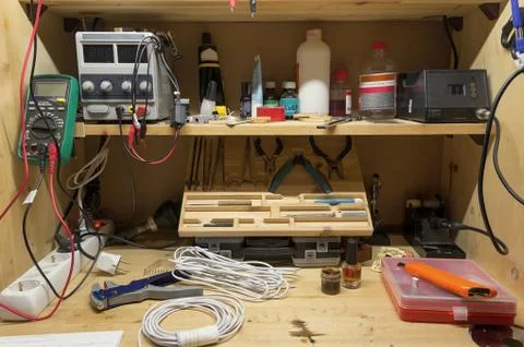 Creative workplace of an inventor. Stock Photos