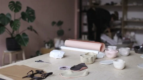 Creative workshop of interior ceramics, female master packs purchase Stock Footage 107310480