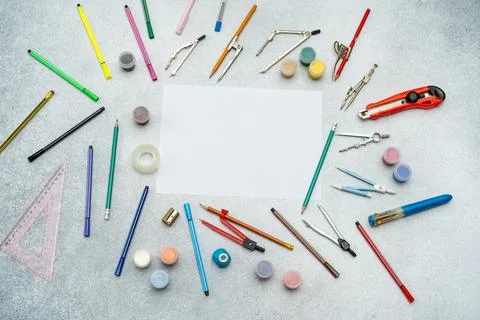 Creative workspace with blank white paper, various supplies back to school .. Stock Photos