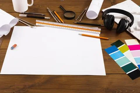 Creative workspace with drawing tools and color swatches Stock Photos