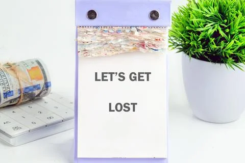 A creative workspace features a colorful note with an inspiring message to Stock Photos