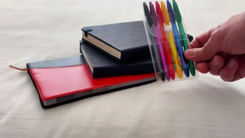 Creative Workspace Featuring Colorful Pens and Notebooks Stock Footage 322895881