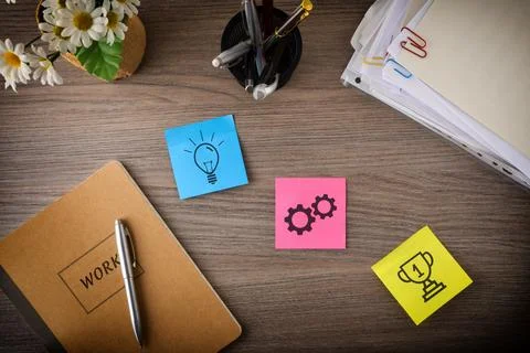 Creative Workspace with Sticky Notes and Office Supplies 스톡 사진