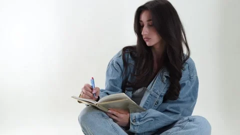 Creative writing and education concept, young woman student writing in notebook Stock Footage 337005864